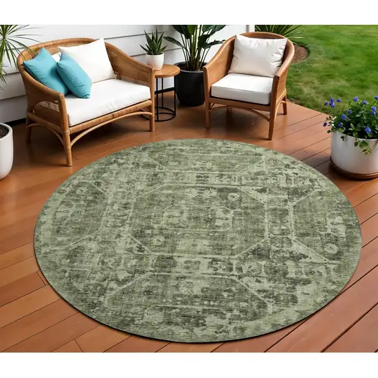 8' Olive Green And Ivory Round Tribal Washable Indoor Outdoor Area Rug Photo 1