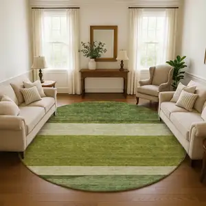 Photo of 8' Olive Green And Ivory Striped Washable Round Rug With UV Protection