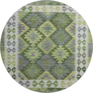 Photo of 8' Olive Green And Ivory Tribal Washable Round Rug With UV Protection