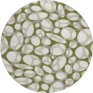 Photo of 8' Olive Green And Linen Round Abstract Washable Indoor Outdoor Area Rug
