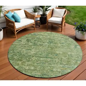 Photo of 8' Olive Green And Sage Round Ikat Washable Indoor Outdoor Area Rug