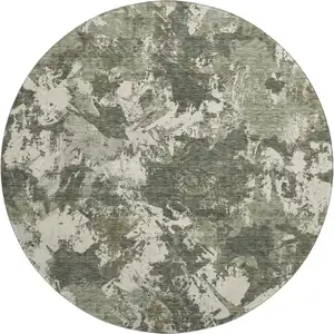 Photo of 8' Olive Green Beige And Ivory Floral Washable Round Rug With UV Protection