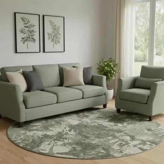 8' Olive Green Beige And Ivory Floral Washable Round Rug With UV Protection Photo 1