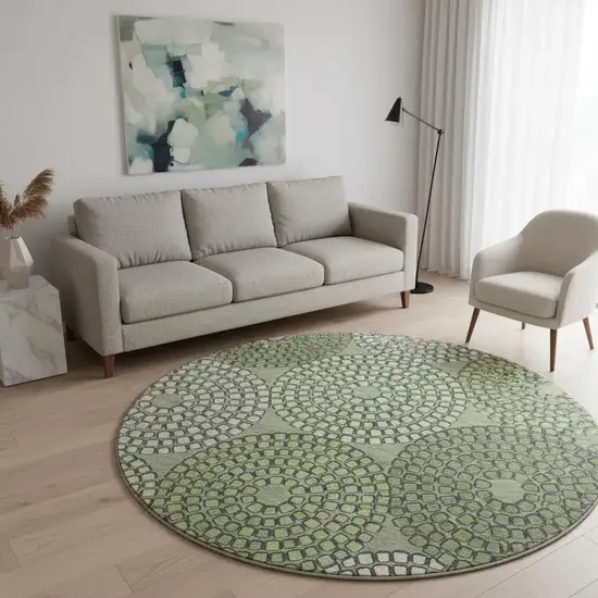8' Olive Green Beige And Ivory Geometric Washable Round Rug With UV Protection Photo 2