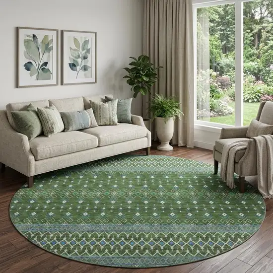 8' Olive Green Blue And Ivory Tribal Washable Round Rug With UV Protection Photo 1