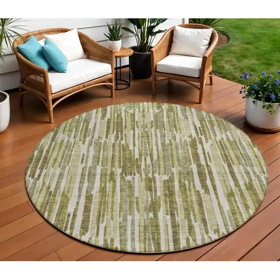 8' Olive Green Brown And Beige Round Abstract Washable Indoor Outdoor Area Rug Photo 1