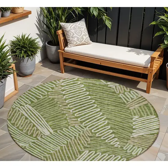8' Olive Green Brown And Ivory Round Floral Washable Indoor Outdoor Area Rug Photo 1