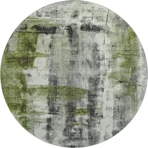 Photo of 8' Olive Green Charcoal And Ivory Abstract Washable Round Rug With UV Protection