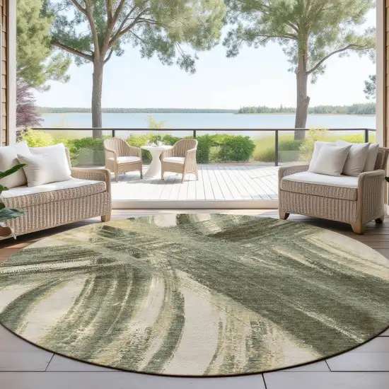 8' Olive Green Gold And Beige Round Abstract Washable Indoor Outdoor Area Rug Photo 4