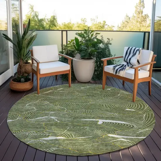 8' Olive Green Gold And Ivory Round Abstract Washable Indoor Outdoor Area Rug Photo 8