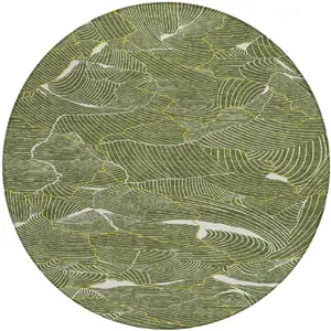 Photo of 8' Olive Green Gold And Ivory Round Abstract Washable Indoor Outdoor Area Rug