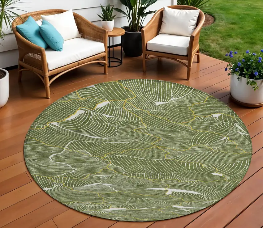 8' Olive Green Gold And Ivory Round Abstract Washable Indoor Outdoor Area Rug Photo 1