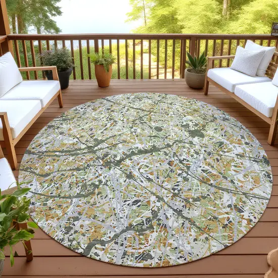 8' Olive Green Gold And Ivory Round Abstract Washable Indoor Outdoor Area Rug Photo 4