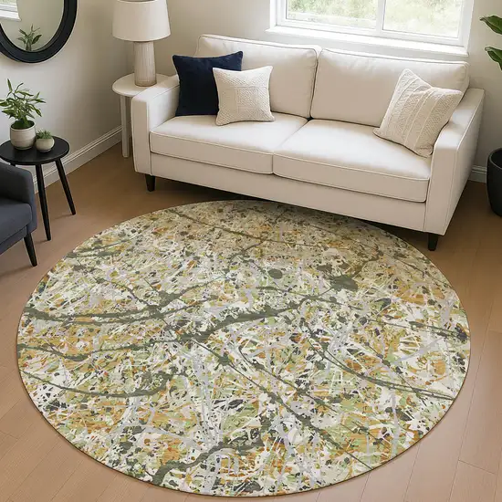 8' Olive Green Gold And Ivory Round Abstract Washable Indoor Outdoor Area Rug Photo 5