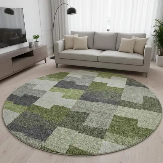 8' Olive Green Gray And Ivory Geometric Washable Round Rug With UV Protection Photo 2