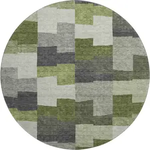 Photo of 8' Olive Green Gray And Ivory Geometric Washable Round Rug With UV Protection