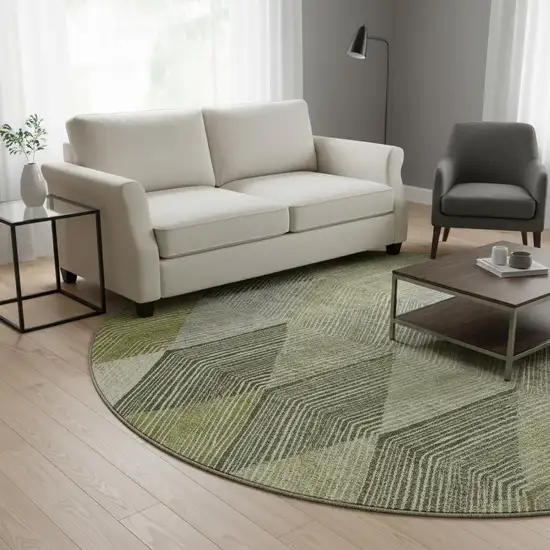 8' Olive Green Gray And Ivory Geometric Washable Round Rug With UV Protection Photo 2