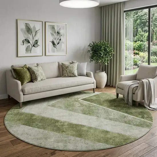 8' Olive Green Gray And Silver Geometric Washable Round Rug With UV Protection Photo 1