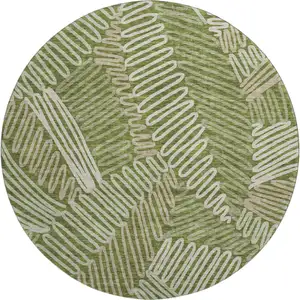 Photo of 8' Olive Green Ivory And Beige Floral Washable Round Rug With UV Protection