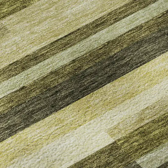 8' Olive Green Ivory And Beige Striped Washable Round Rug With UV Protection Photo 8