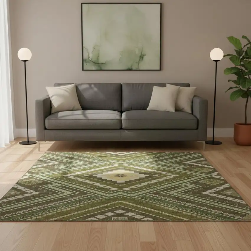 8' Olive Green Ivory And Brown Tribal Washable Round Rug With UV Protection Photo 2