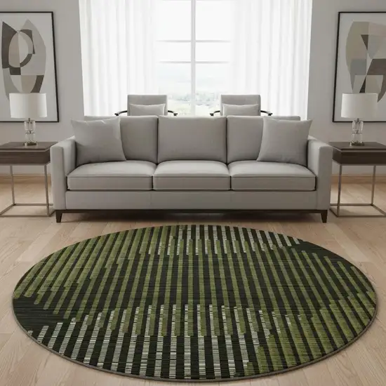 8' Olive Green Ivory And Charcoal Geometric Washable Round Rug With UV Protection Photo 2