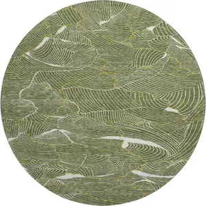 Photo of 8' Olive Green Ivory And Gold Abstract Washable Round Rug With UV Protection