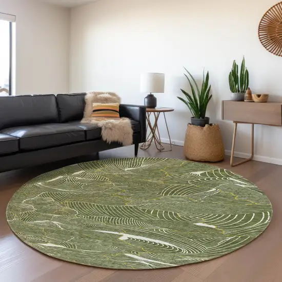8' Olive Green Ivory And Gold Abstract Washable Round Rug With UV Protection Photo 4