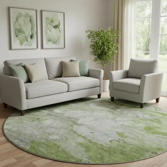 8' Olive Green Ivory And Gray Abstract Washable Round Rug With UV Protection Photo 1