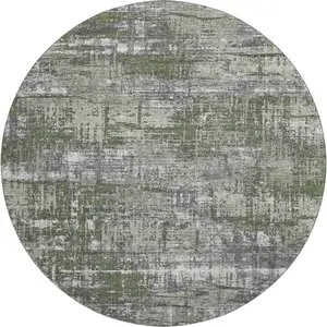 Photo of 8' Olive Green Ivory And Gray Geometric Washable Round Rug With UV Protection