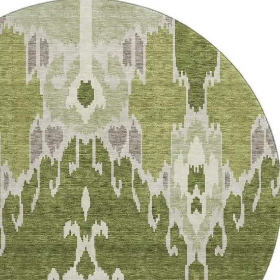8' Olive Green Ivory And Gray Ikat Washable Round Rug With UV Protection Photo 4