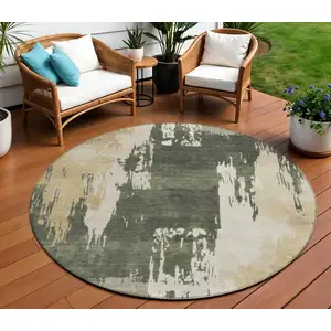 Photo of 8' Olive Green Ivory And Tan Round Abstract Washable Indoor Outdoor Area Rug