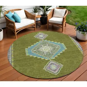Photo of 8' Olive Green Pink And Ivory Round Oriental Washable Indoor Outdoor Area Rug