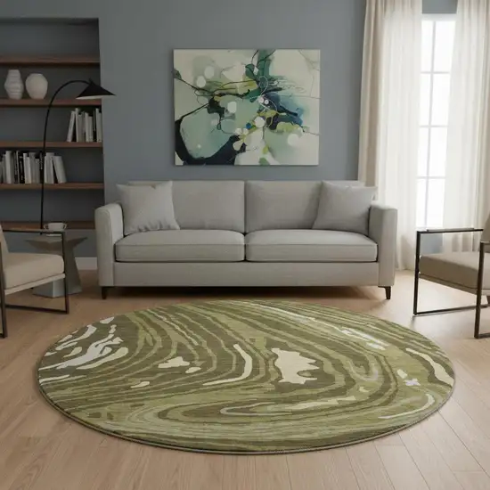 8' Olive Green Wheat And Ivory Abstract Washable Round Rug With UV Protection Photo 2