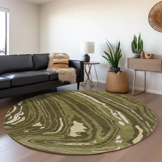 8' Olive Green Wheat And Ivory Abstract Washable Round Rug With UV Protection Photo 4