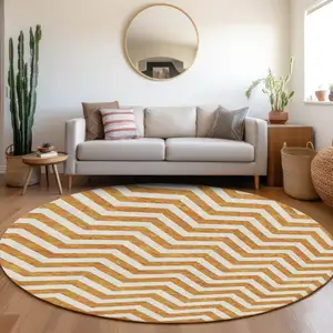 Photo of 8' Orange And Beige Round Chevron Washable Indoor Outdoor Area Rug