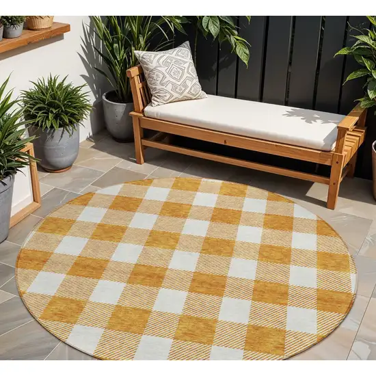 8' Orange And Beige Round Plaid Washable Indoor Outdoor Area Rug Photo 1