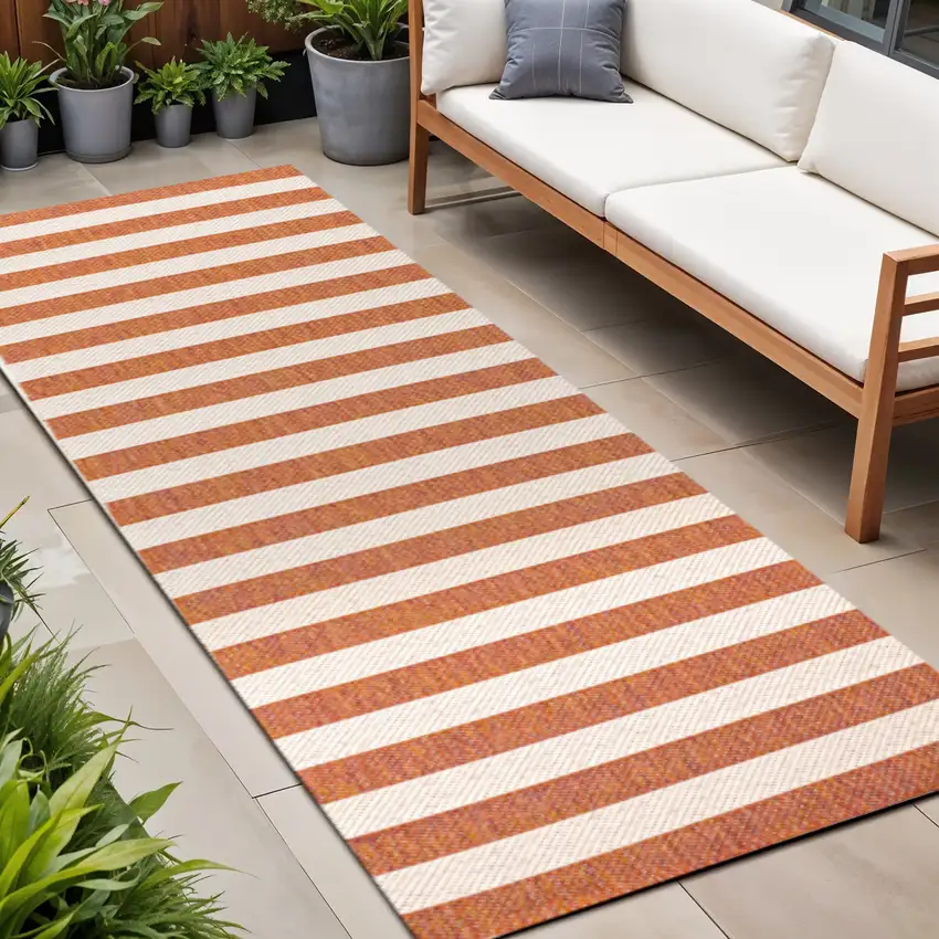 8' Orange And Beige Striped Indoor Outdoor Runner Rug Photo 1