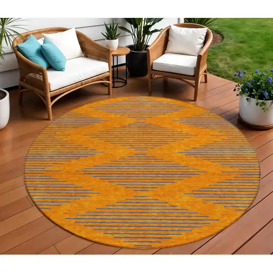 8' Orange And Blue Round Geometric Washable Indoor Outdoor Area Rug Photo 1