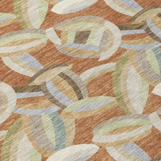 8' Orange And Brown Round Abstract Washable Indoor Outdoor Area Rug Photo 7