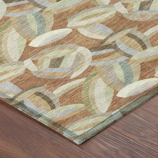 8' Orange And Brown Round Abstract Washable Indoor Outdoor Area Rug Photo 6