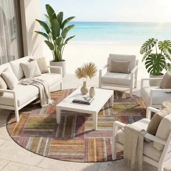 8' Orange And Brown Round Geometric Washable Indoor Outdoor Area Rug Photo 1