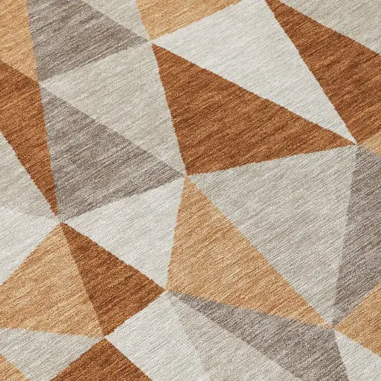8' Orange And Brown Round Geometric Washable Indoor Outdoor Area Rug Photo 4