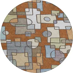 Photo of 8' Orange And Copper Round Geometric Washable Indoor Outdoor Area Rug