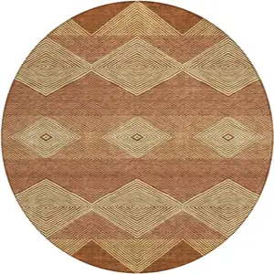 Photo of 8' Orange And Copper Round Geometric Washable Indoor Outdoor Area Rug