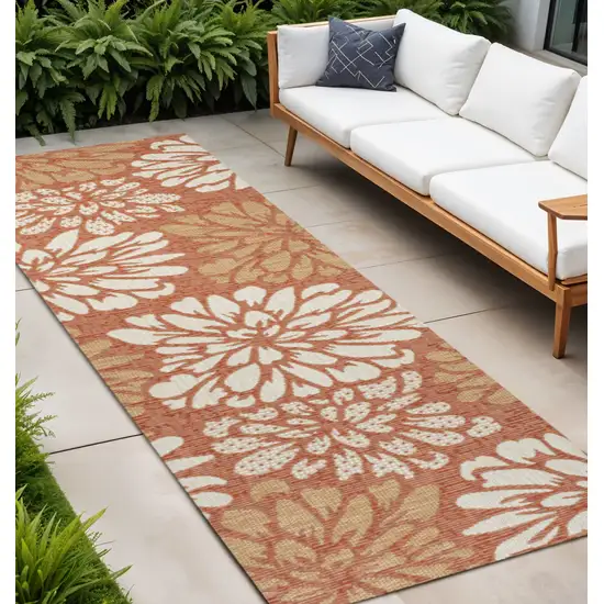 10' Orange And Cream Floral Indoor Outdoor Runner Rug Photo 1