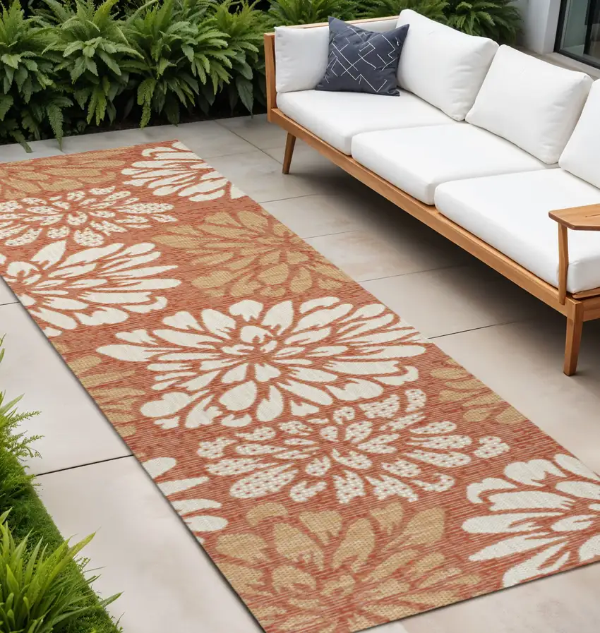 10' Orange And Cream Floral Indoor Outdoor Runner Rug Photo 1