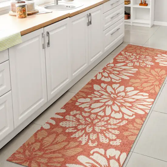 8' Orange And Cream Floral Indoor Outdoor Runner Rug Photo 6