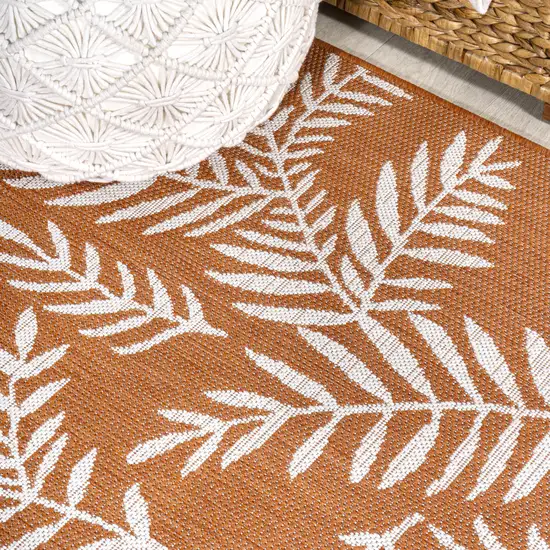 8' Orange And Cream Floral Indoor Outdoor Runner Rug Photo 6