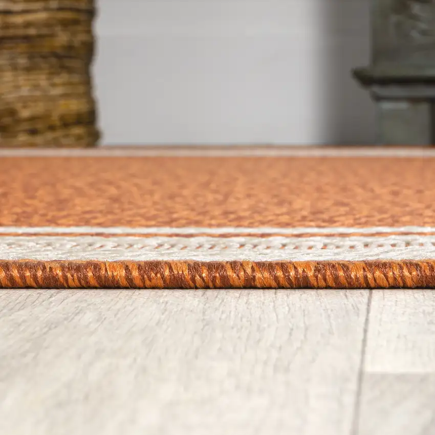 8' Orange And Cream Indoor Outdoor Runner Rug Photo 7